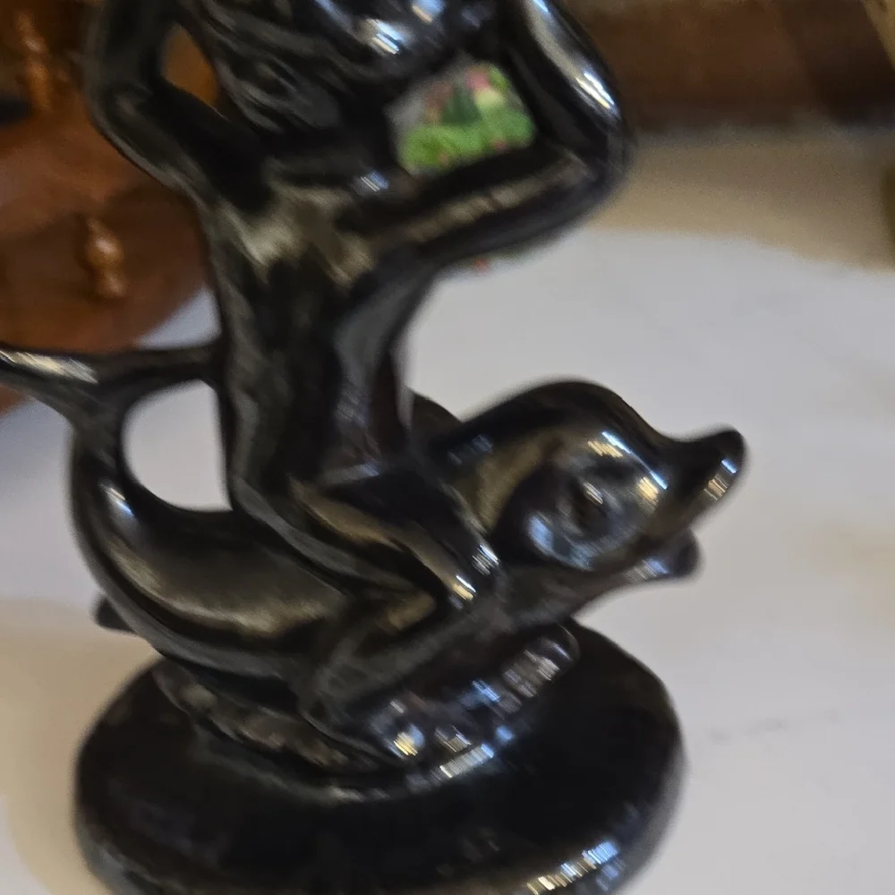 Black Ceramic Figurine with Mythical Design